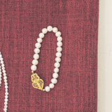 Pulseira pérolas com Coração de Viana